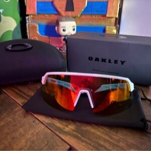 Oakley White Frame Sunglasses with Red Mirror Lens